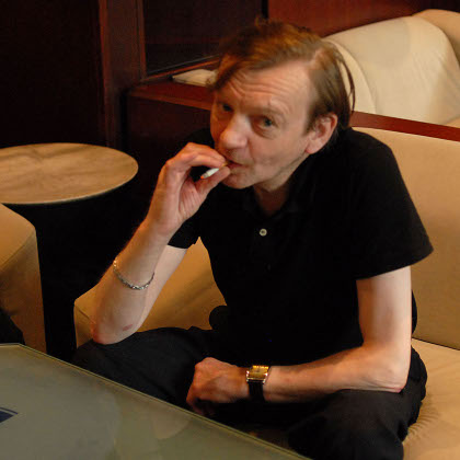 MARK E. SMITH